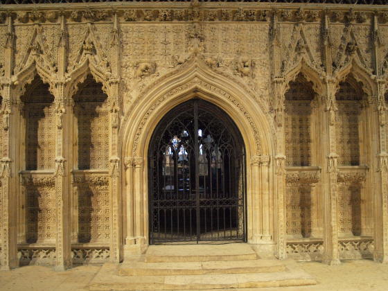 A white stone screen in a cathedral